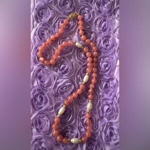 Rhodochrosite beads knotted w/ 14k accents, clasp & freshwater pearls 17”